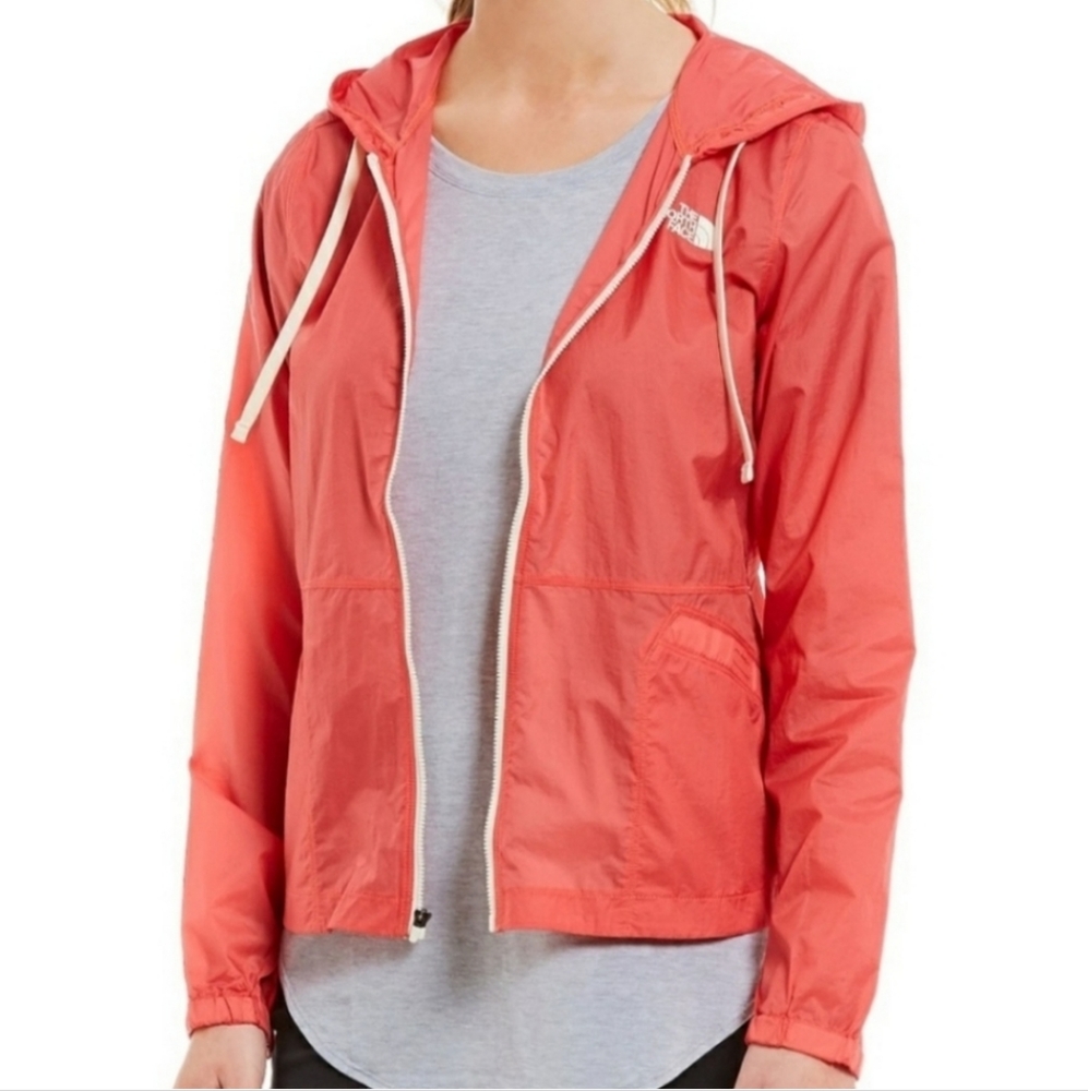 The North Face coral windbreaker jacket